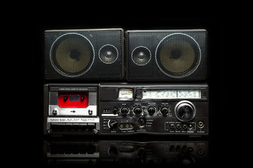 Vintage boom box on black background
