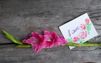 Pink flower with a card(love)