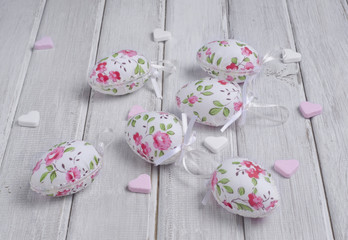 Colorful flowers on the handmade wooden background