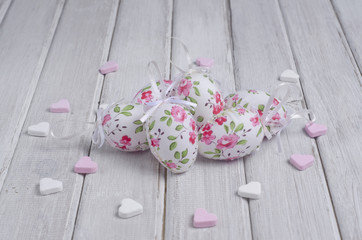 Colorful flowers on the handmade wooden background