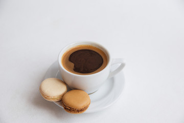 Cup of coffee with macaroons, americano, espresso, white space, background, selective 