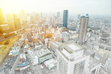 Asia Business concept for real estate - panoramic modern cityscape building bird eye aerial view under sunrise and morning blue bright sky in Osaka, Japan. Mix hand drawn sketch illustration
