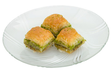 Baklava with pistachio on a white background