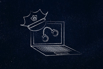  laptop with police hat & handcuffs, against piracy or cyber cri