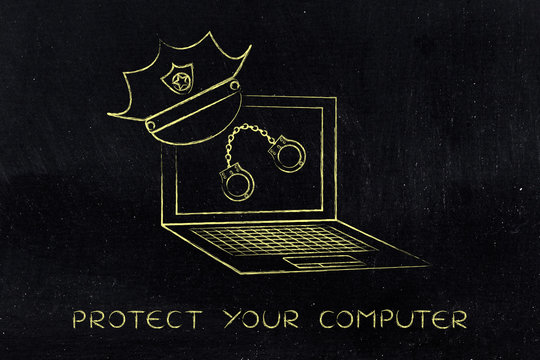  laptop with police hat & handcuffs, against piracy or cyber cri
