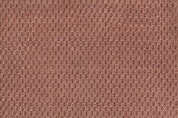 Dark brown background from soft fleecy fabric closeup. Texture of textile macro