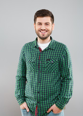 Fototapeta premium Man in green checked T-shirt
