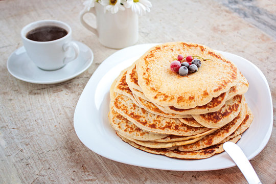 Pancakes with berries. Maslenitsa. Selective focus