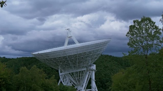 4k UHD The giant Effelsberg 100-m Radio Telescope under dark clouds time lapse. 11478
