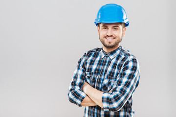 Man in blue building helmet