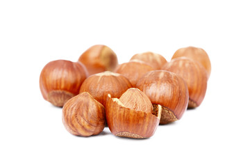 Group fresh hazelnuts isolated on white background