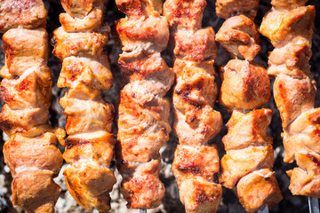 Pork shish kebab on skewers roasted on grill