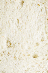 Fresh sliced white bread in close-up shot isolated on white background