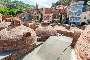Abanotubani - ancient district of Tbilisi, Georgia, known for its sulfuric baths. The roof with...