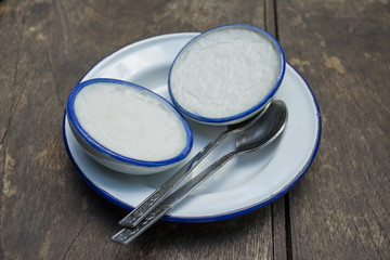 coconut milk custard in the small porcelain cup