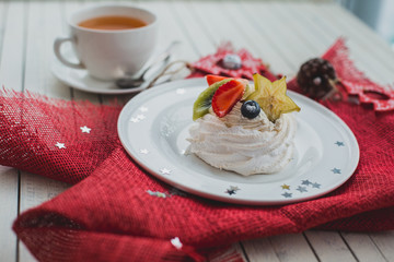 Beautiful white dessert on a red napkin