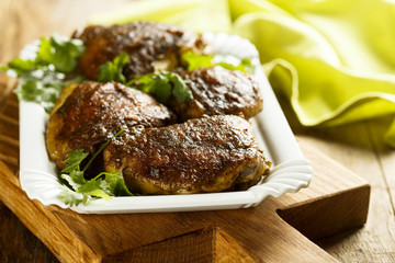 Chicken, baked with spices and coconut milk