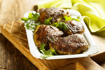 Chicken, baked with spices and coconut milk