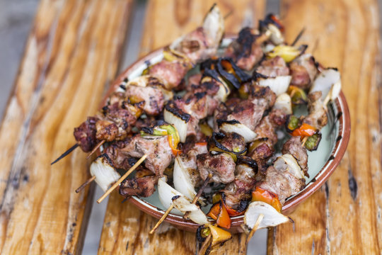 Skewers of grilled vegetables and meat