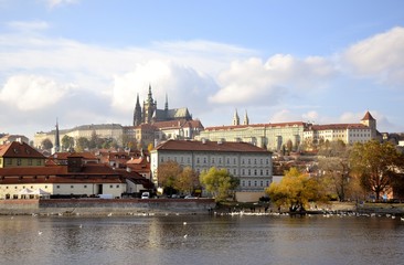 Fototapeta premium Architecture of Prague and cloudy sky 