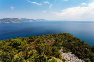 Top view of the sea strait or bay without boats and people from the restaurant Vidicovac. Quiet, calm. Croatia, Plomin.