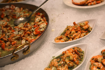 pink shrimp cooked with parsley and broth