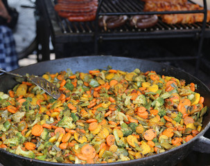 large pot with carrots broccoli peppers