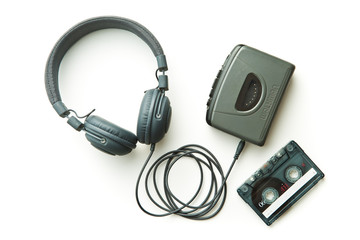 Vintage walkman, audio tape and headphones. - obrazy, fototapety, plakaty
