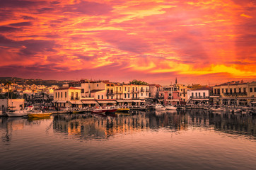 RETHYMNO, CRETE ISLAND, GREECE  JUNE 29, 2016: Stunning sunset over the old venetian port of Rethimno on Crete island Greece.