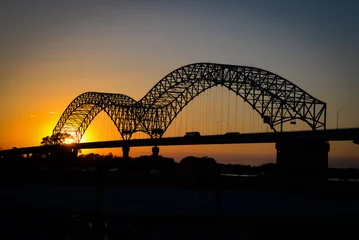 Foto auf Glas Sonnenuntergangsbrücke © Chris
