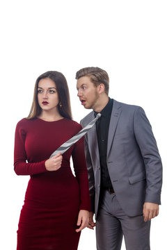 Girl In A Red Dress Pulling Man By Tie