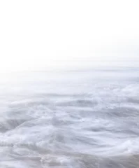 Crédence de cuisine en verre imprimé Eau Hi-Key Swirling Ocean. A hi-key rendition of blurred ocean water movement, with a gradient fading to white providing plenty of copy space.