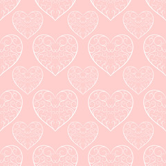 The pattern of the beautiful white openwork hearts on pale pink