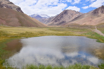 Small lake in Andean landscape