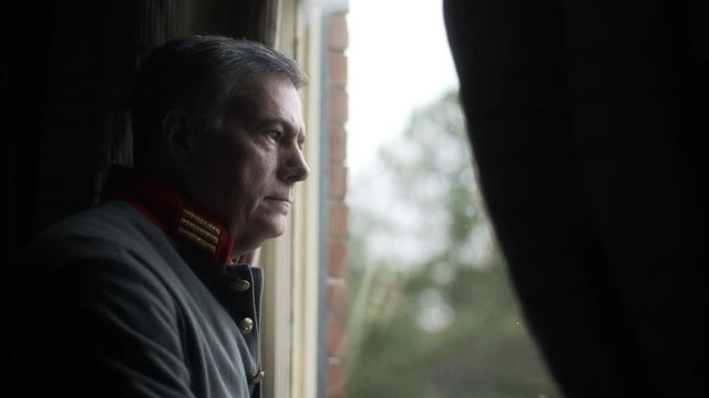 confederate captain looking out of a window thinking 4k