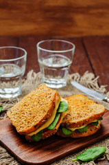 Spinach tomato cheese grilled rye sandwiches