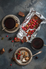 Chocolate with berries and pistachios, top view