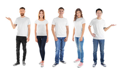 Fototapeta na wymiar Young people wearing different t-shirts on white background