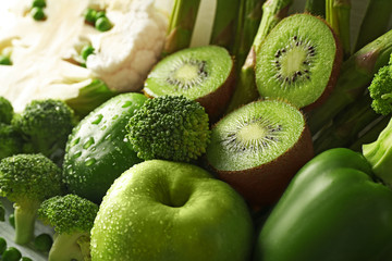 Naklejka na ściany i meble Green vegetables and fruits, close up