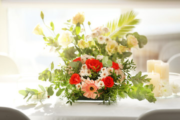 Flower arrangement on a white table