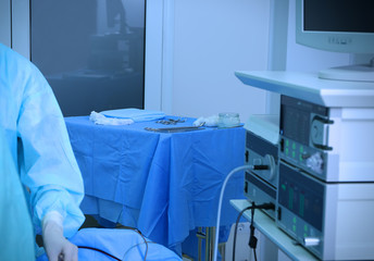 Table with medical instruments and special equipment in operating room