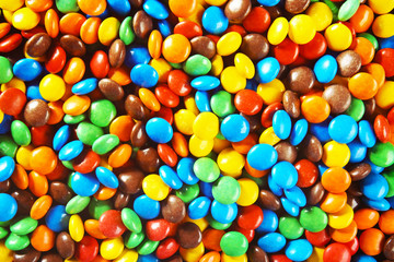 Fototapeta na wymiar Delicious colorful candies background