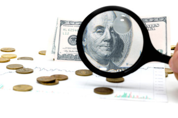 Viewing dollars with a magnifying glass