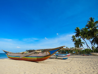 Catamaran on the White Sand Beach