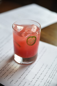 Pink drink with ice cubes