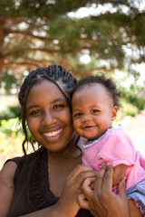 African American teenage mother and her daughter.