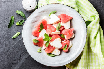 Salad with watermelon, feta cut as hearts. Valentine day menu