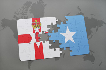 puzzle with the national flag of northern ireland and somalia on a world map