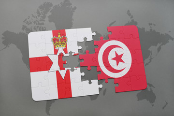 puzzle with the national flag of northern ireland and tunisia on a world map