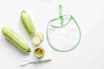 cooking vegetable puree for baby on white background top view